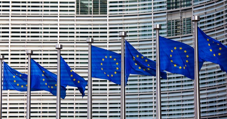 EU flags flying outside the European Parliament